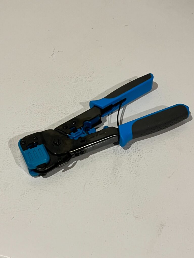 crimping tool on a white surface
